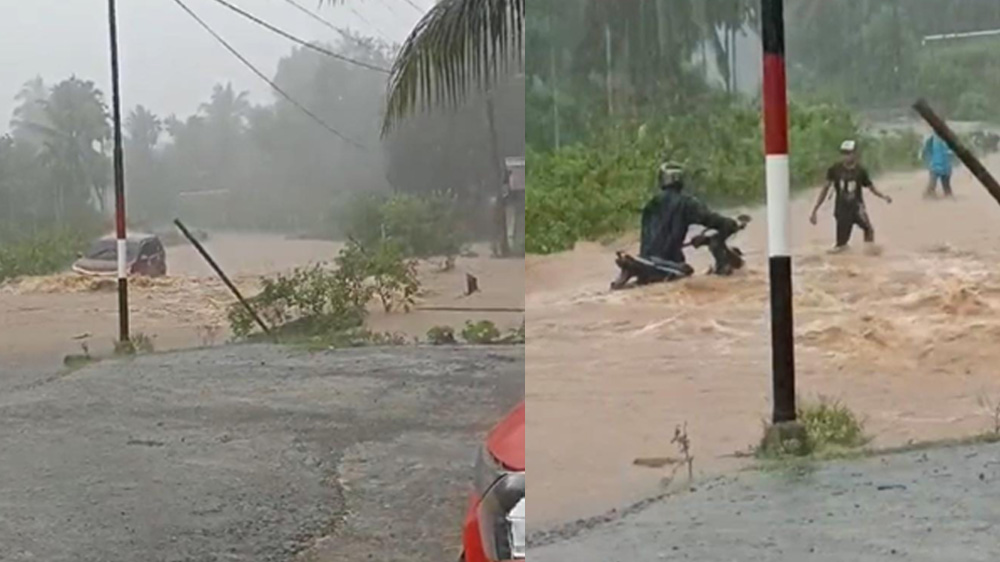 Debit Air Sungai Akibat Jalan Lintas Lagan Bungin Tertutup Banjir, Pengendara Sepeda Motor Nyaris Terseret Aru